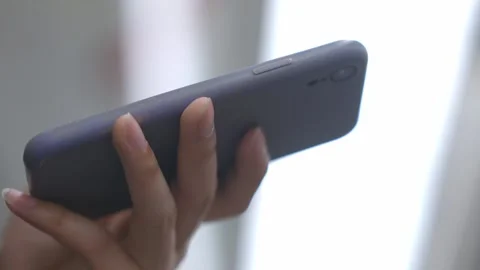 Young man using mobile phone in subway Stock Footage 168273733