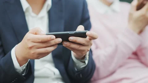 Young man using mobile phone in subway Stock Footage 168273738