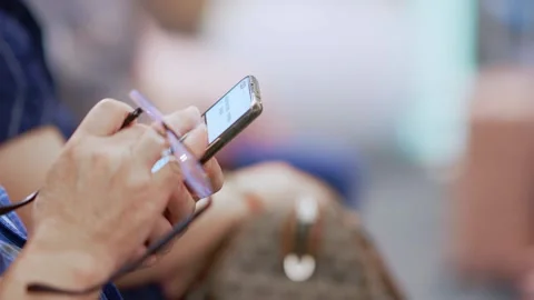 Young man using mobile phone Stock Footage 168273901