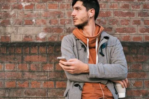 Young man using mobile phone. Stock Photos