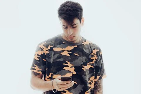 Young man using mobile phone Stock Photos