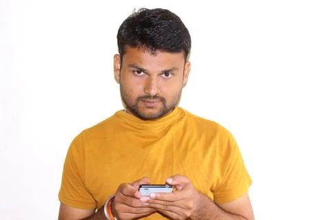 Young man using mobile phone Stock Photos