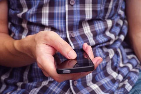 Young Man using mobile smart phone Stock Photos