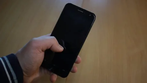 Young man using phone Stock Footage 131219092