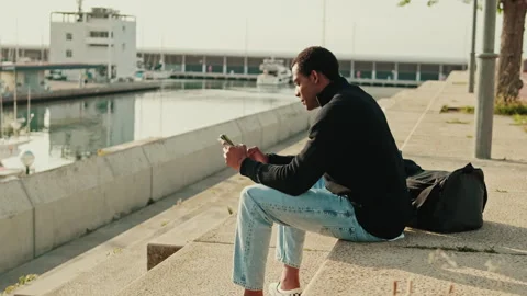 Young Man Using Phone by Marina Stock Footage 310850891