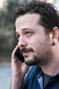 Young Man Using Phone Stock Photos