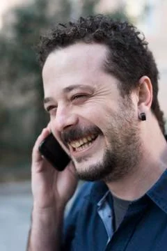 Young Man Using Phone Stock Photos