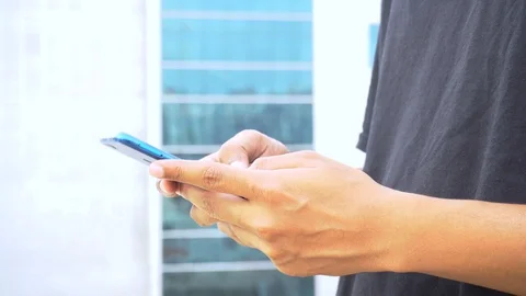 Young man using the smart phone- stay connected Stock-Footage 129322092