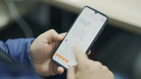 Young man using smart phone Stock Footage 194528610