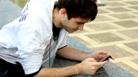 Young man using smartphone Stock Footage 37263682