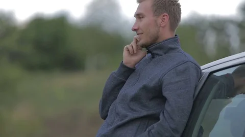 Young man using a smartphone Stock-Footage 71574099