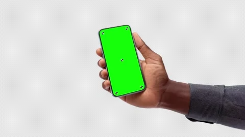 Young man using smartphone with green mock up screen chroma key, vertical mode Stock Footage 306172250