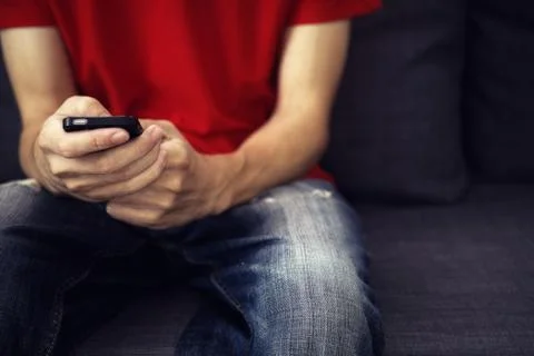 Young man using smartphone at night Stock Photos