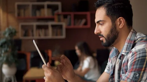 Young Man Using Tablet 動画素材 91829358