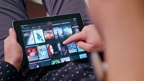 A Young Man Using a Tablet Indoors. Stock Footage 83794087