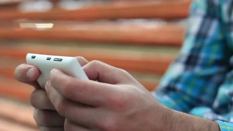 Young Man Using Touchscreen Phone Stock Footage 120123471