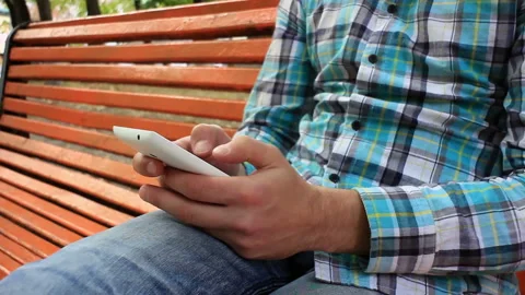 Young Man Using Touchscreen Phone Stock Footage 120124255