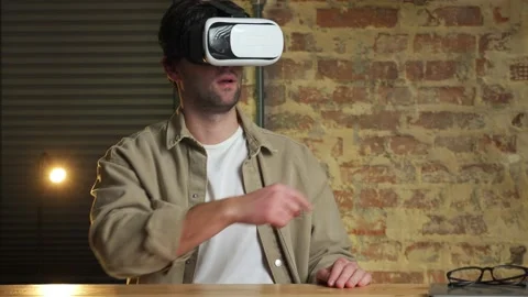 Young man using virtual reality headset. VR, future, gadgets, technology Vídeo Stock 233283923