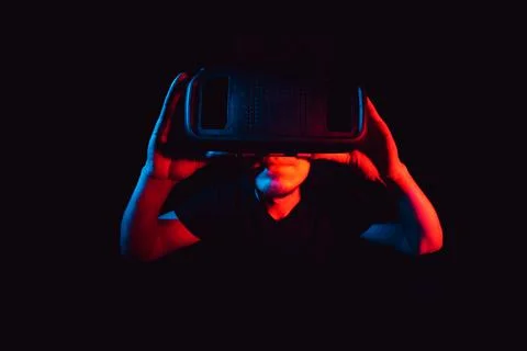 Young man using virtual reality headset VR. education online, studying concept Stock Photos