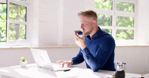 Young Man Using Voice Recognition Function Stock Footage 241951983