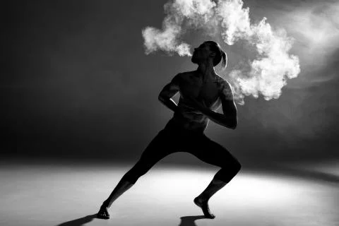 Young man vaping Stock Photos