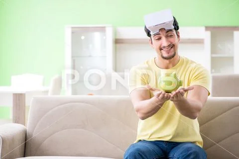Young man with virtual reality goggles Stock Photos