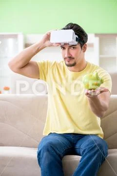 Young man with virtual reality goggles Stock Photos