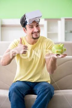 Young man with virtual reality goggles Stock Photos