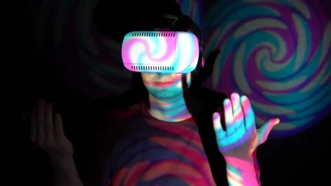 Young man with virtual reality headset, inviting to come Stock Footage 86820355