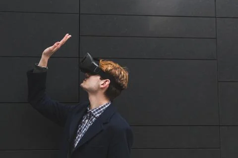 Young man with virtual reality headset Stock Photos
