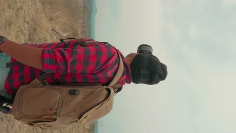 Young man with VR headset exploring nature Stock Footage 231006010