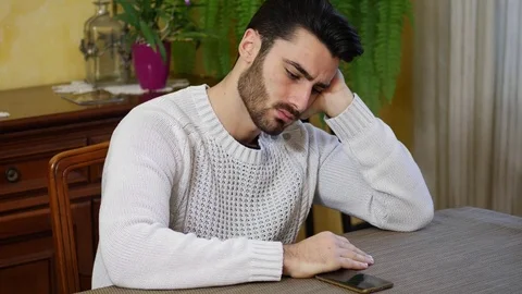 Young man waiting for call Stock Footage 84601857