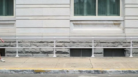 Young Man Walking Across on Sidewalk Slow Motion Stock Footage 40292319