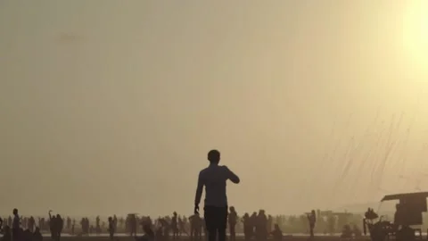 Young man walking alone in the crowd Stock Footage