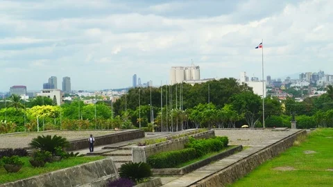 A young man walking on the area Stock Footage 72137380