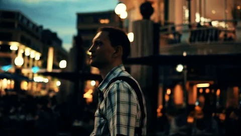 Young man walking around exploring Georgetown Harbor neighborhood Stock Footage 80208209