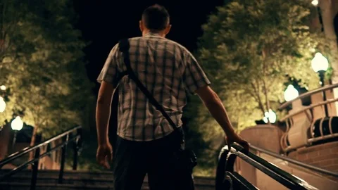 Young man walking around exploring Georgetown Harbor neighborhood Stock Footage 80208255