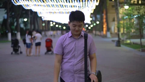Young man walking around exploring Georgetown Harbor neighborhood of Washington Stock Footage 93258887