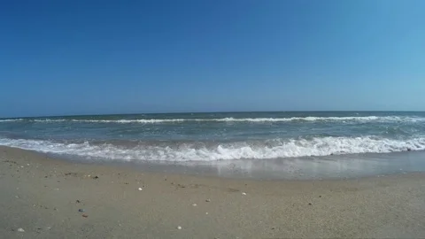 Young man walking on the beach 2 Video stock 96195920