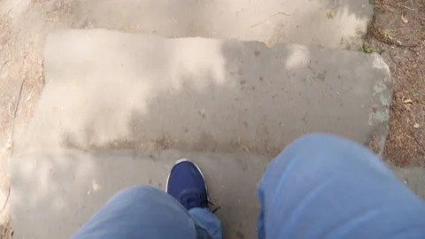 A young man walking down the stairs top down view Vídeo Stock 130254131