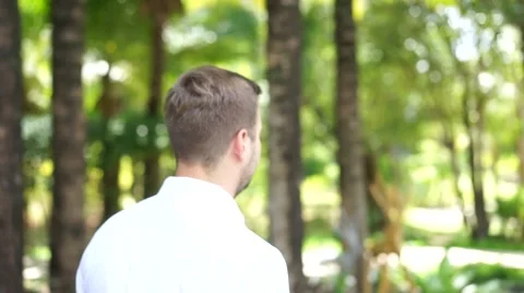 Young man is walking. Stock Footage 60780632