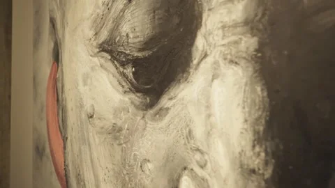 Young man walking inside museum and contemplating art at exhibition 스톡 동영상 245465772