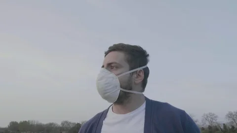 Young Man Walking with Protective Mask for Prevention Against Coronavirus 2 Видео 127064534