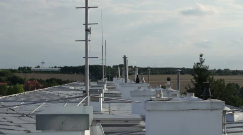 Young man walking on the rooftop Stock Footage