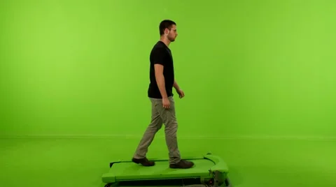 Young man walking sms greenscreen 4K Stock Footage 63114132