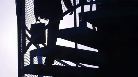 Young man walking up the stairs Stock Footage 72554717