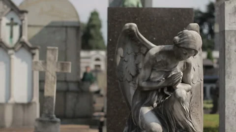 A young man walking through the old cemetery. Milan, Italy. Stock Footage 60239962