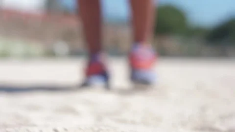 Young man walking towards the camera slow motion Stock Footage 82731080