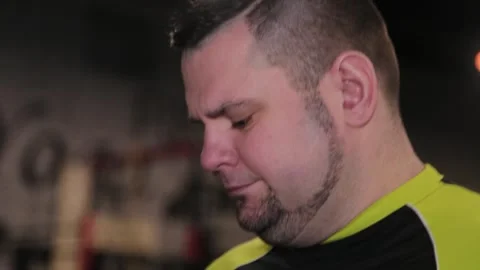 Young man walking on a treadmill in a gym Stock-Footage 337766427