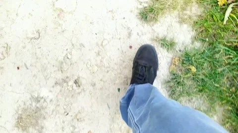 Young man walks along the path in the autumn season. pov video Stock Footage 162953857